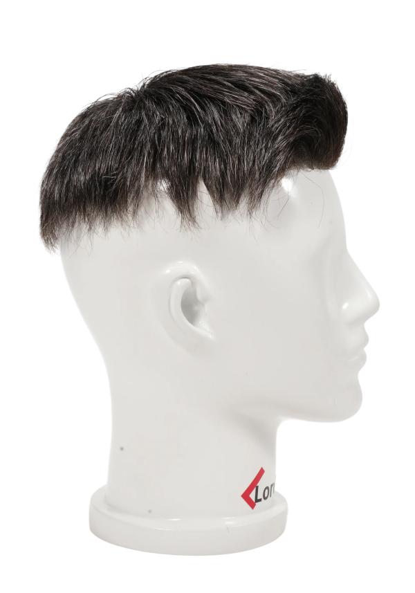 Precut hair piece with a quiff style