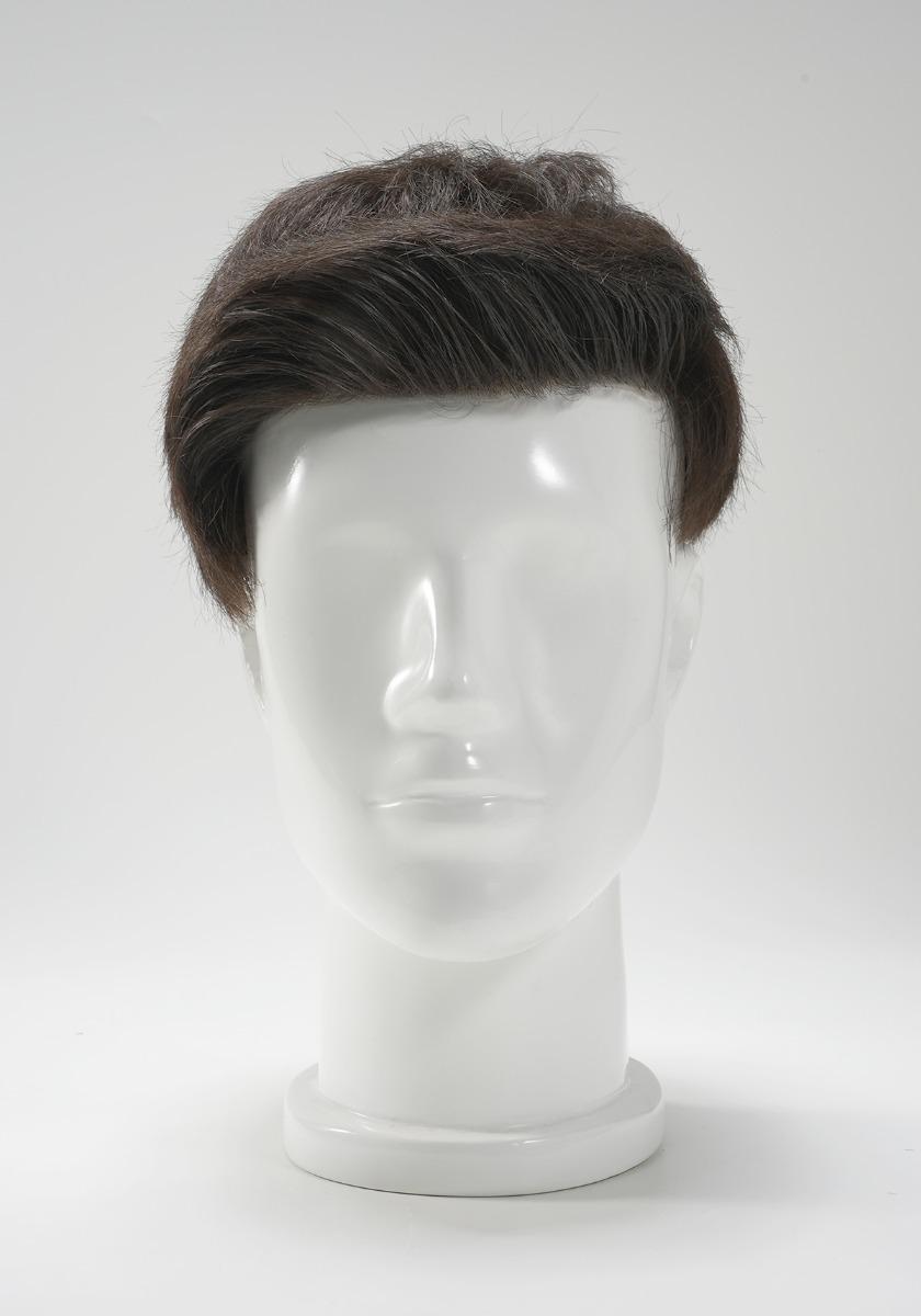 Precut hair piece with a quiff style