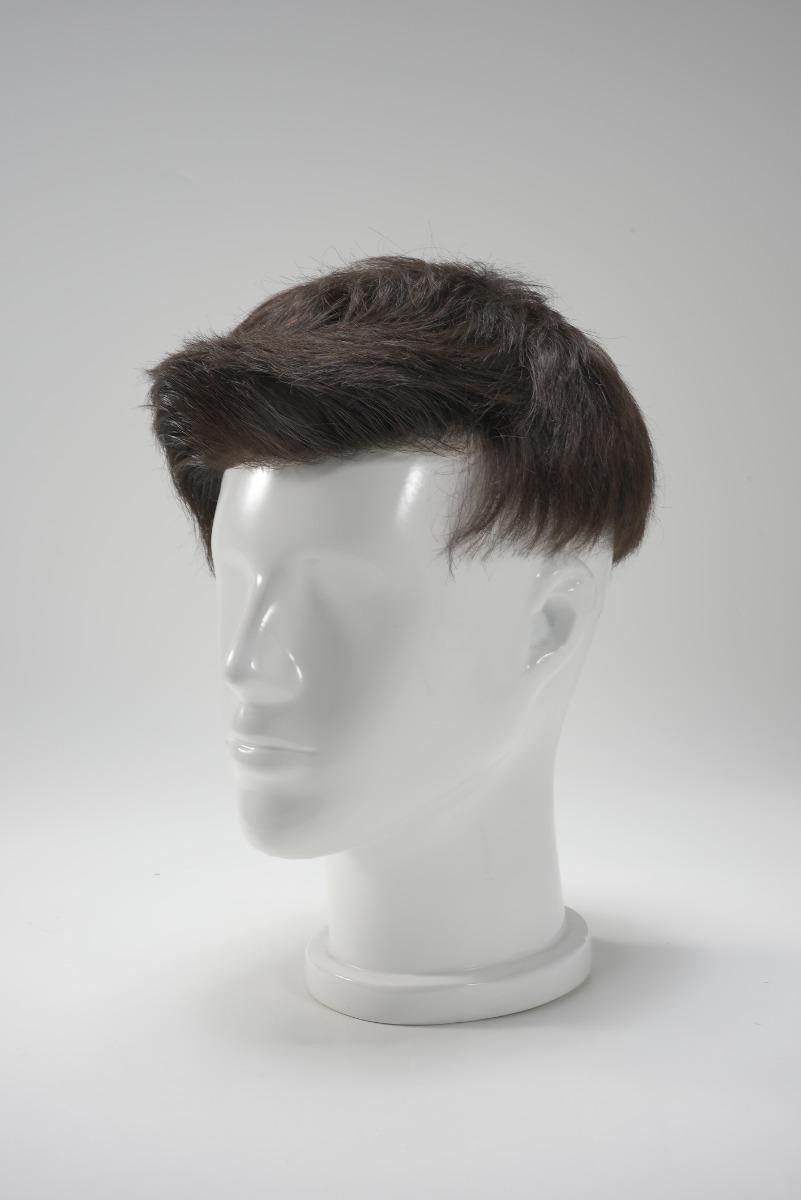Custom toupee based on a quiff hairstyle