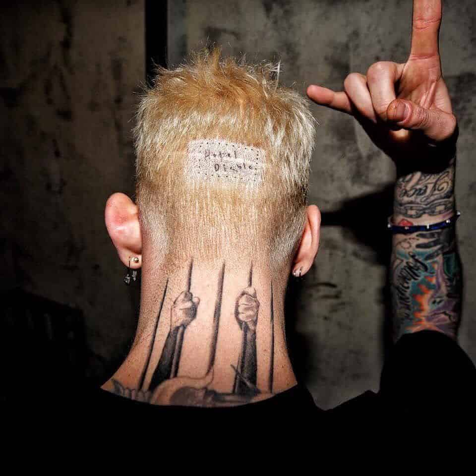 Back of Machine Gun Kelly's head that shows scar 