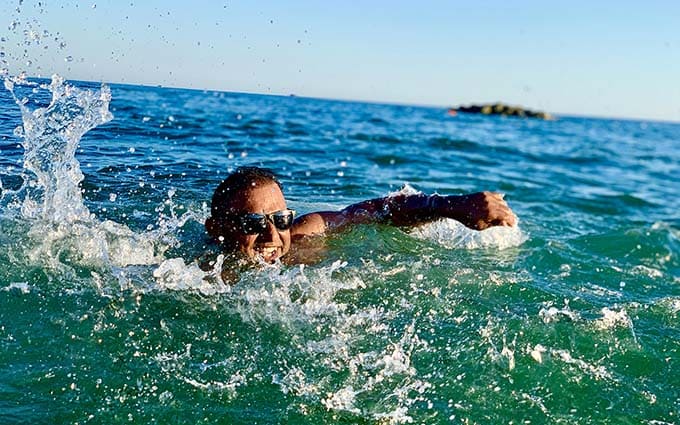 swim with a hair system in the sea
