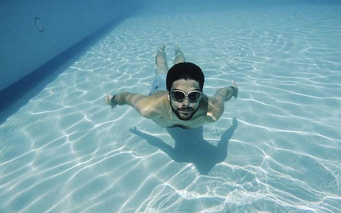 swimming with hair system in pool
