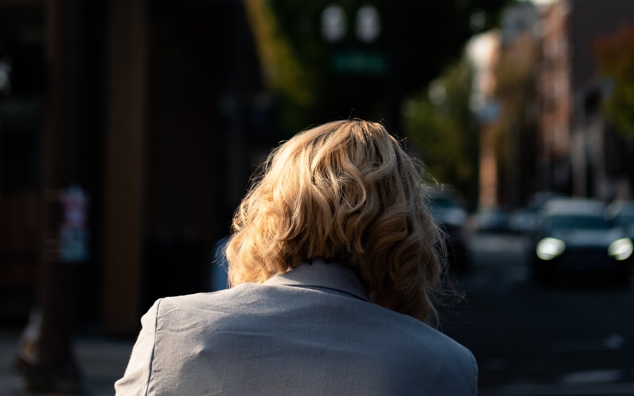 Back of blonde woman's head 