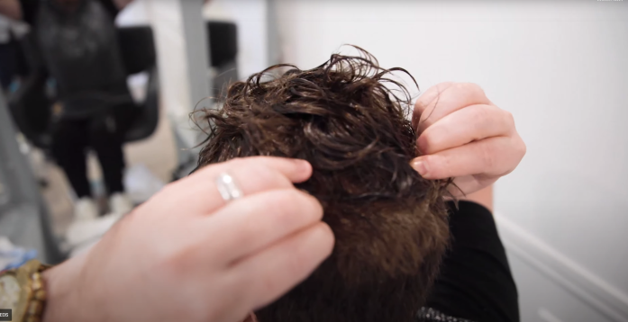 washing a toupee