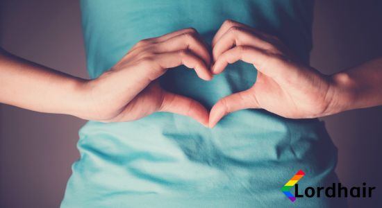 Woman making a heart shape with her hands