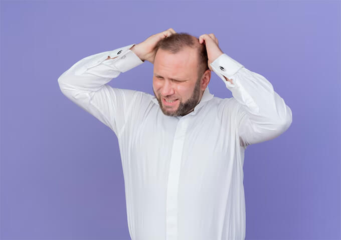 Distressed Men Removes Hand Heavily Frustrated Over Losing Hair